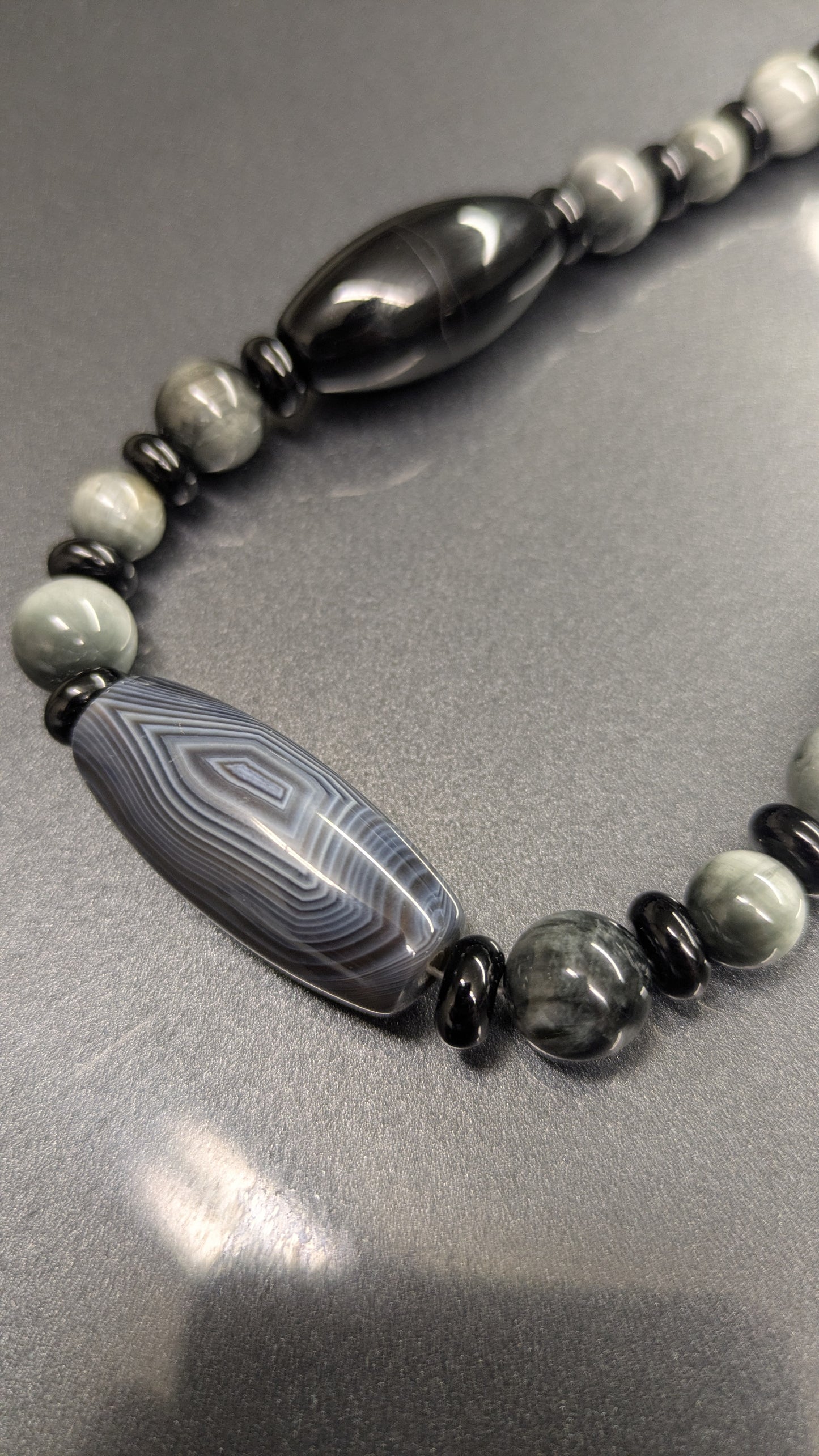 Black onyx X hawk eye X agate