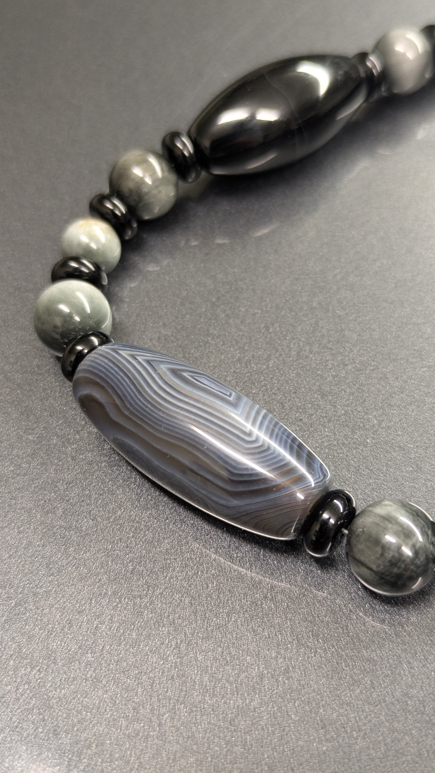 Black onyx X hawk eye X agate